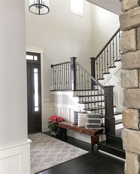 Neutral Modern Farmhouse Foyer With Wainscoting Stained And Painted