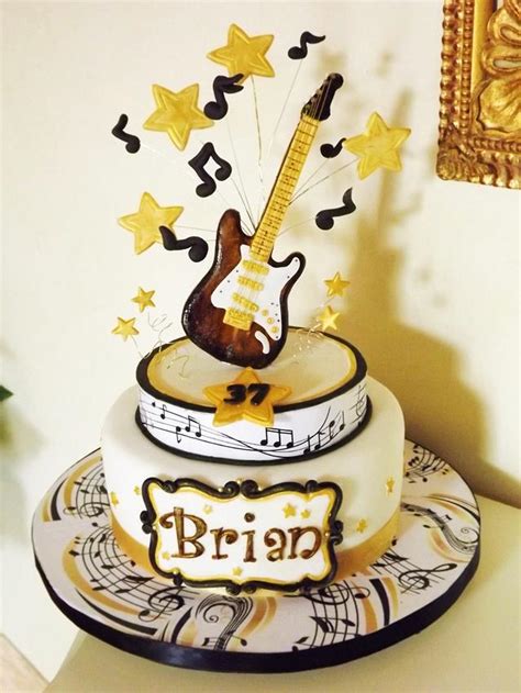 Guitar Cake Decorated Cake By Lovely Cakes Simona Cakesdecor