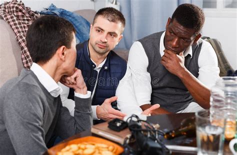 Serious Friends Talking In A Restaurant Stock Photo Image Of Friends
