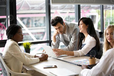 Group Of Diverse Business People Collaborating In Office Or Multiethnic