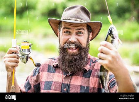 Hands Holding A Fishing Rod Hi Res Stock Photography And Images Alamy