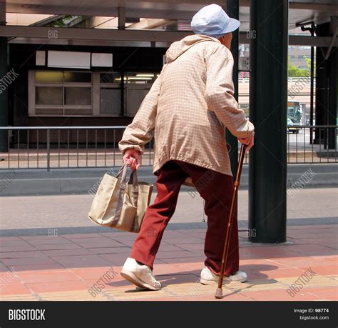 Old Woman Walking Image Photo Free Trial Bigstock