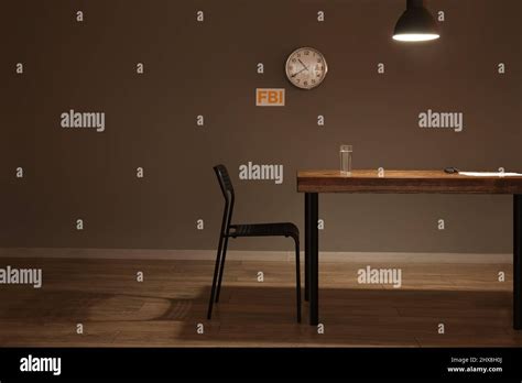 Table And Chair In Empty Interrogation Room Stock Photo Alamy