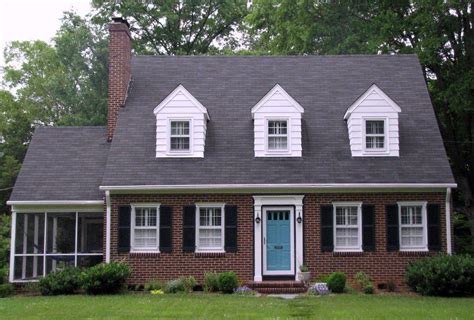 red brick house with black shutters - Treats Weblogs Slideshow