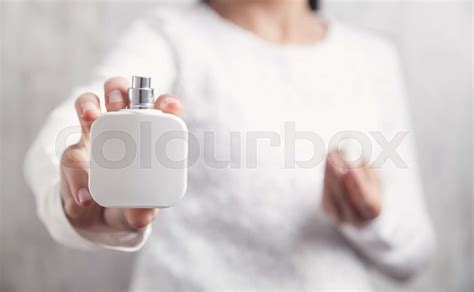 Girl Holding Bottle Of Perfume Stock Image Colourbox