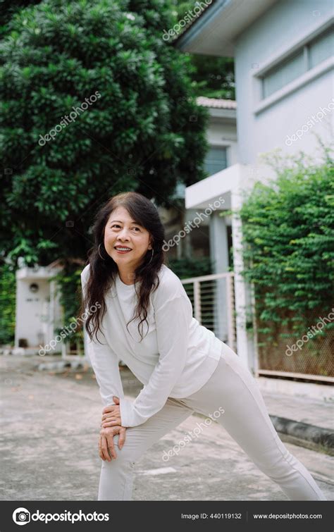 Portrait Asian Healthy Old Woman Stretching Body Warm Exercise Stock