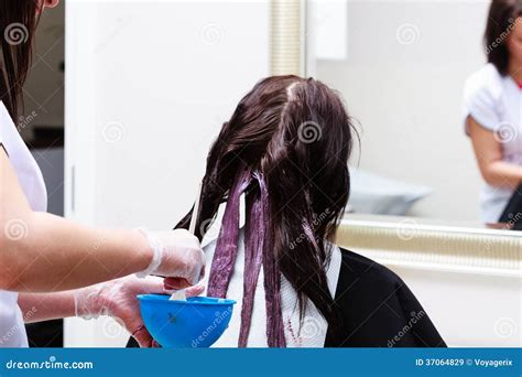 Hairdresser Applying Color Female Customer At Salon Doing Hair Dye