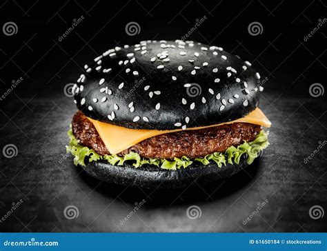 Black Burger And Americano Stock Photography 101509706