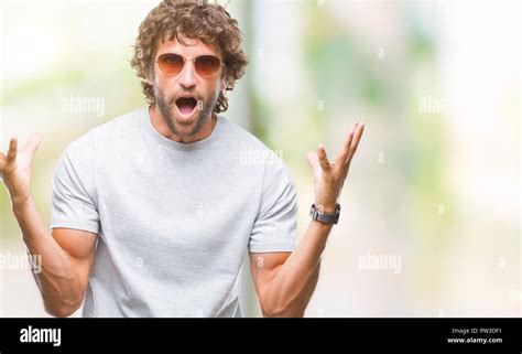 Handsome Hispanic Model Man Wearing Sunglasses Over Isolated Background