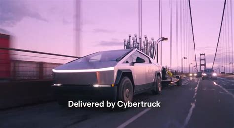 cybertruck-delivering-art-exhibit-powerwall-3-solar roof - TESLARATI