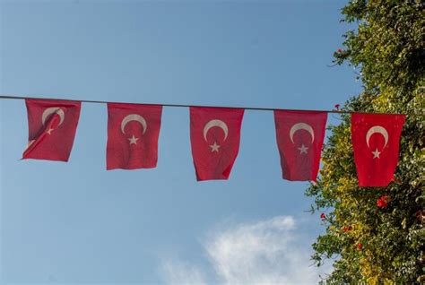 Premium Photo Turkish National Flags With White Star And Moon In Sky