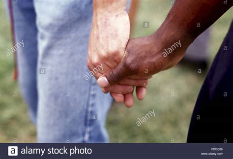 Gay Couple Holding Hands High Resolution Stock Photography And Images Alamy
