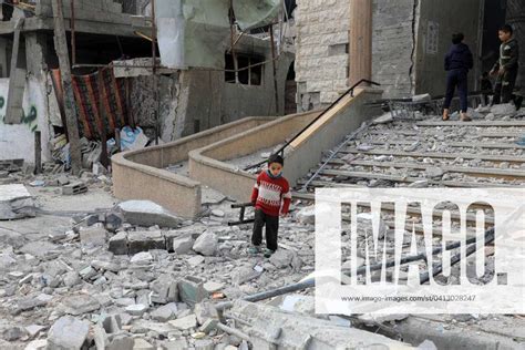 240212 GAZA Feb 12 2024 A Palestinian Boy Stands Among The