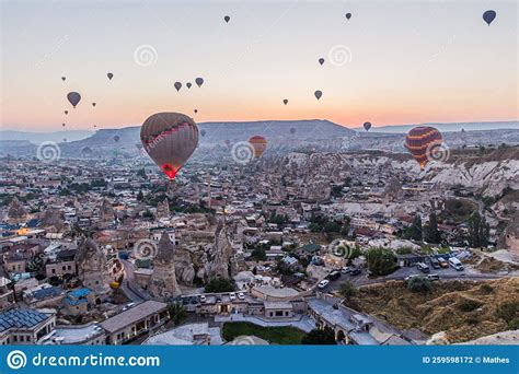 Early Morning Aerial View Of Hot Air Balloons Above Goreme Village In Cappadocia Turk Stock