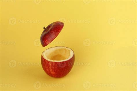 Healthy Red Cut Apple Floating Top Slice Juice Drink Idea Concept On
