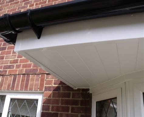 Installation Of Black PVC Guttering And White UPVC Barge Boards