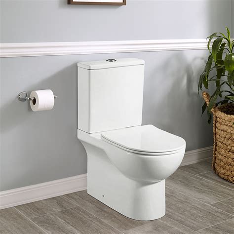 Ortonbath Two Piece Dual Flush Rimless Turnado Tall Bowl Toilet With