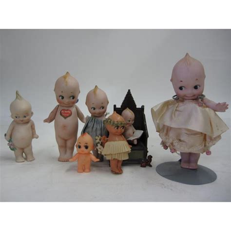 Set Of 7 Antique Kewpie Dolls