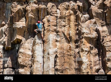 Man Climbing Hells Gate National Park In Kenya Stock Photo Alamy