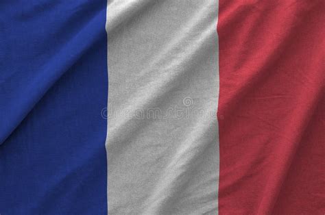 France Flag Depicted On Folded Wavy Fabric Of Old Cloth Stock Image