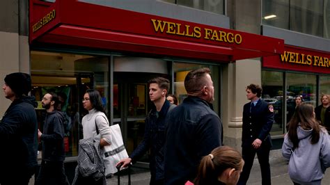 Wells Fargo Beats Expectations but Sets Aside Money for Loan Losses ...