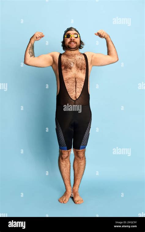 Comic Portrait Of Funny Bearded Man In Swimsuit And Swimming Cap And