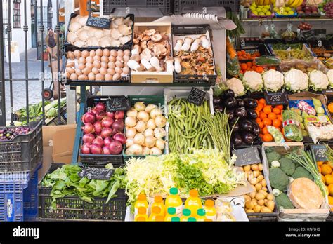 Fresh Fruit And Vegetables On Display Outside A Small Shop In The