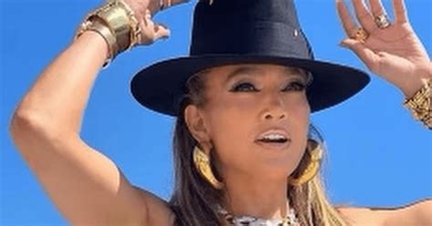 As She Celebrates Her Birthday With A Sultry Photoshoot Jennifer Lopez Shines In A String Bikini