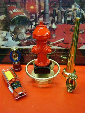 Fire Hydrant Trophy mounted on solid brass vintage fire extinguisher cap