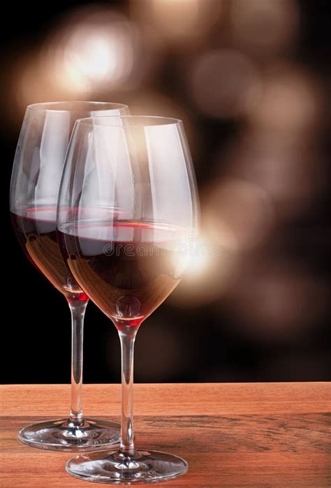 Two Glasses With Deep Red Wine On Dark Wood Stock Image Image Of