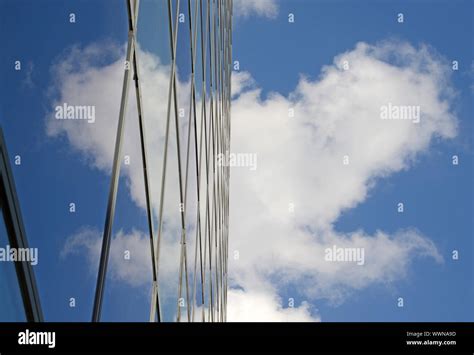 Glass facade with reflection Stock Photo - Alamy