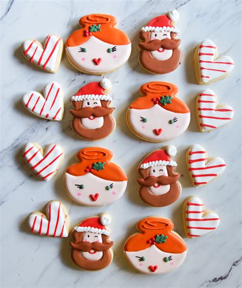 Newlywed Santa and Mrs. Claus Cookies | Bake at 350°