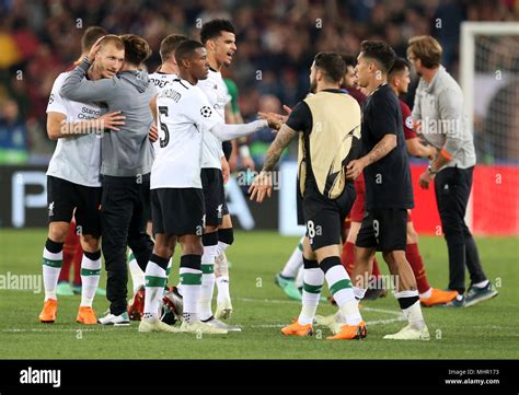 Liverpool players celebrate reaching the Champions League Final after ...