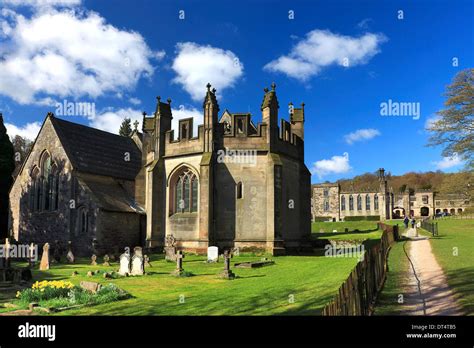 Spring Daffodils Church Of The Holy Cross And Ilam Hall In The Village