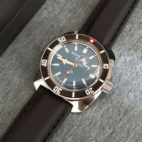 Two Brand New Vostok Amphibia Watches One Factory Original One Modded
