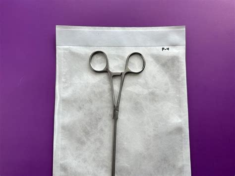Used Aesculap Allis Scanlan Forcep 290 Cm Curved Left 900275