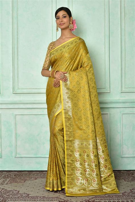 Buy Samyukta Singhania Yellow Katan Tanchoi Silk Botanic Woven Saree