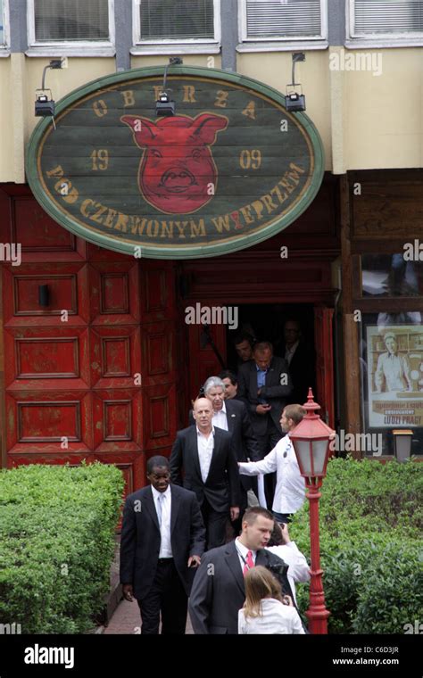 Bruce Willis outside Red Hog restaurant after having a business meeting ...