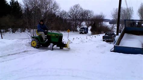 Deere 318 Plowing Snow Youtube