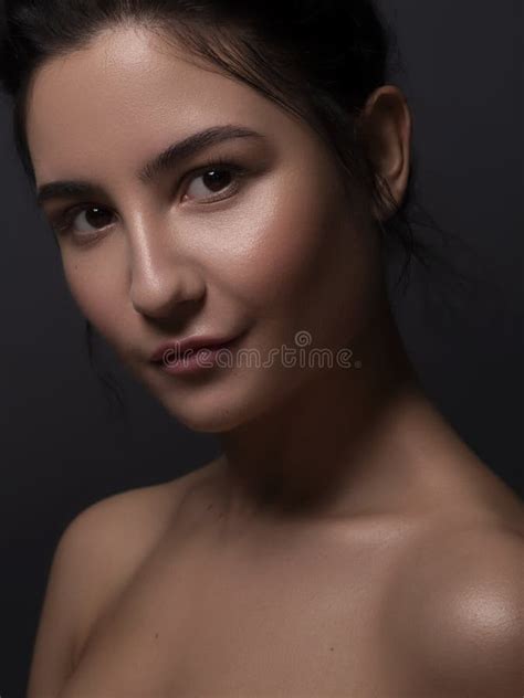 Close Up Portrait Of Brunette Woman With Flawless Clean Skin Natural Neutral Make Up Stock