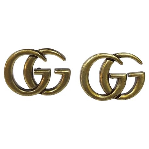 Gucci Gg Logo Gold Plated Earrings At 1stdibs Gucci Gg Earrings Gold Gucci Earrings Gold