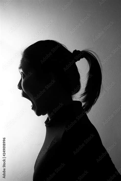 Silhouette Angry Scary Portrait Of Asia Long Hair Woman In Black And