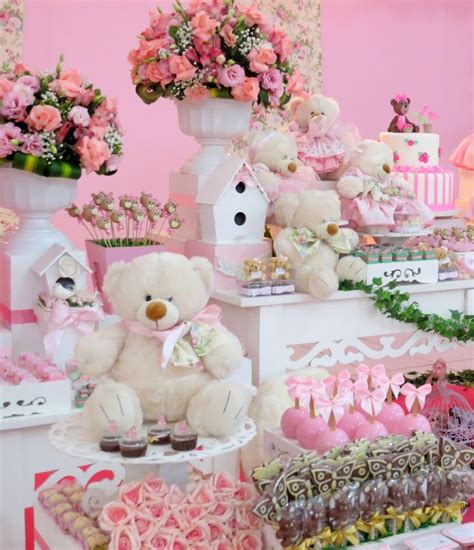 Teddy Bears And Cakes Are On Display In A Pink Room With White