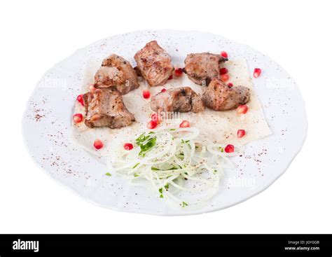 Delicious Beef Shish Kebab On Pita With Onions And Pomegranate Seeds