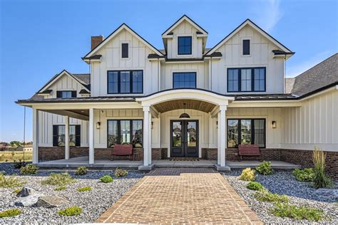 Spacious Modern Farmhouse Plan With Option To Finish Walkout Basement