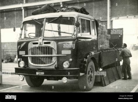 A FIAT 682 truck been loaded, Italy Stock Photo - Alamy