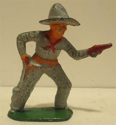 Vintage Cast Iron Cowboy With Six Shooter Barclay S