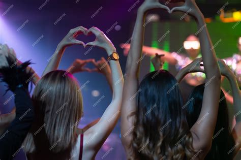 Premium Photo Close Up Hand Love Or Mini Heart Nightlife And Disco