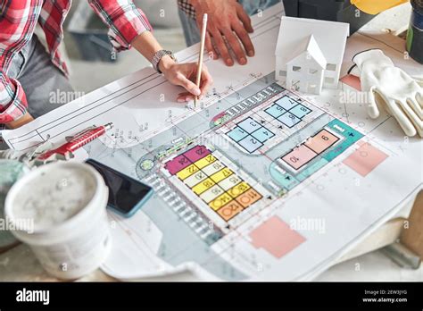 Two Building Designers Working At A Technical Drawing Stock Photo Alamy
