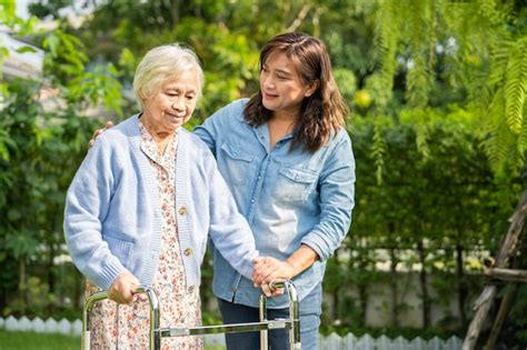 Premium Photo Doctor Caregiver Help And Care Asian Senior Woman